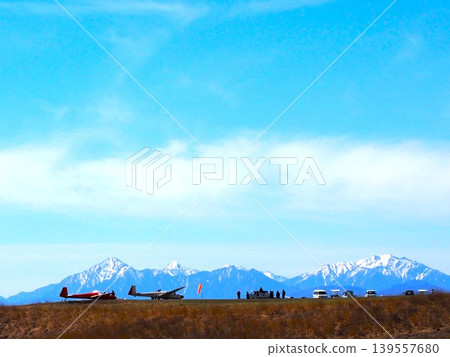 Kirigamine Plateau under a blue sky and a glider Kirigamine Plateau under a blue sky and a glider 139557680