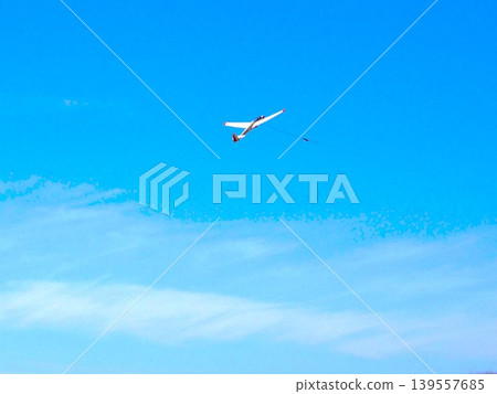 Glider in the blue sky Glider in the blue sky 139557685