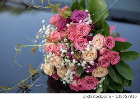 Bridal Rose Bouquet Reflected on Car Hood Bridal Rose Bouquet Reflected on Car Hood 139557910