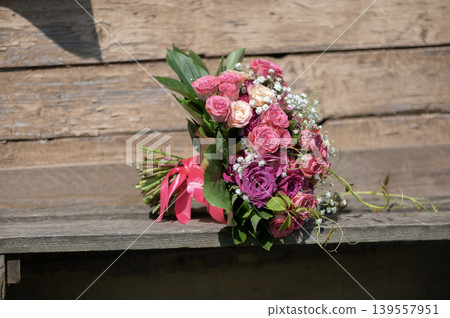 Rustic Bridal Bouquet on Wooden Bench Rustic Bridal Bouquet on Wooden Bench 139557951