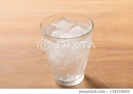 Sparkling water with lemon Sparkling water with lemon 139558045
