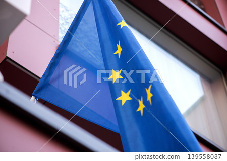 European Union Flag Mounted On Urban Building European Union Flag Mounted On Urban Building 139558087