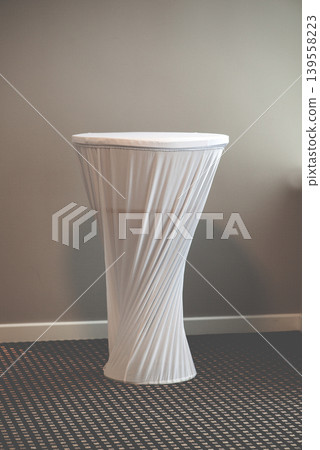Elegant Cocktail Table With White Stretch Cover Elegant Cocktail Table With White Stretch Cover 139558223