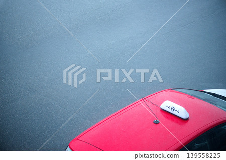 Red Car Roof With Taxi Sign From Above Red Car Roof With Taxi Sign From Above 139558225