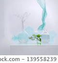 Glass vases, lilac flowers, and teal smoke minimal still life 139558239