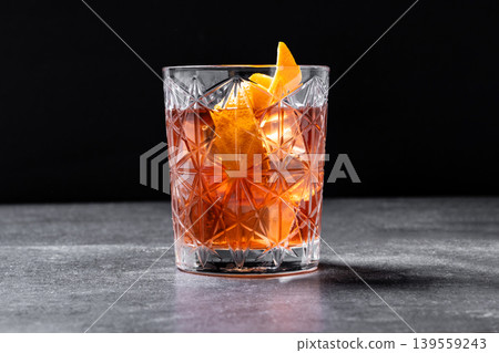 Old Fashioned Cocktail with Orange Peel 139559243