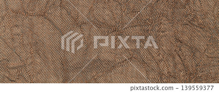 Warm brown crumpled textured background from textile material. Wrinkled caramel fabric surface, macro Warm brown crumpled textured background from textile material. Wrinkled caramel fabric surface, macro 139559377