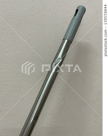Close Up Of Dented Stainless Steel Broom Handle Damaged During Transportation Close Up Of Dented Stainless Steel Broom Handle Damaged During Transportation 139559844