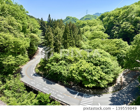 A view of the winding road of the old National Route 18 from the Usui Pass Megane Bridge. A view of the winding road of the old National Route 18 from the Usui Pass Megane Bridge. 139559849
