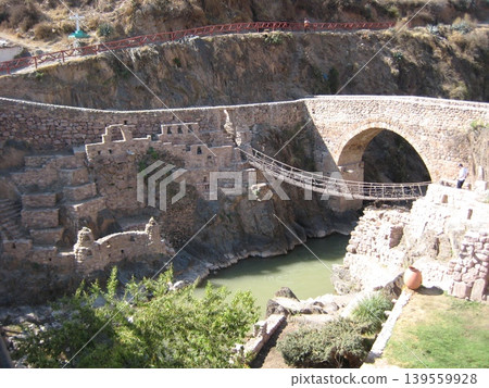 Inca suspension bridges and Spanish-era stone bridges remaining in Checacupe, Peru Inca suspension bridges and Spanish-era stone bridges remaining in Checacupe, Peru 139559928