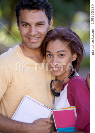 Student, couple and portrait with books at university campus for reading education, learning or literature. Man, woman and face smile at college academy or academic degree for future, growth or study Student, couple and portrait with books at university campus for reading education, learning or literature. Man, woman and face smile at college academy or academic degree for future, growth or study 139560189