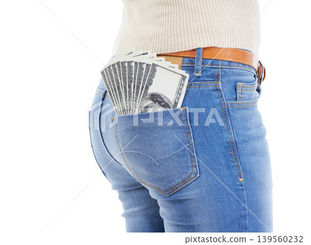 Back, person and dollars in studio of jeans pocket for financial freedom, gambling and lottery bonus on white background. Closeup, pants and winner with money fan, cashback savings or rich investment 139560232