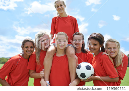 Women, soccer players and portrait with ball, confidence and football field for match, competition or game. Fitness, practice and happy for training, outdoor and exercise for athlete, girls or sport Women, soccer players and portrait with ball, confidence and football field for match, competition or game. Fitness, practice and happy for training, outdoor and exercise for athlete, girls or sport 139560331