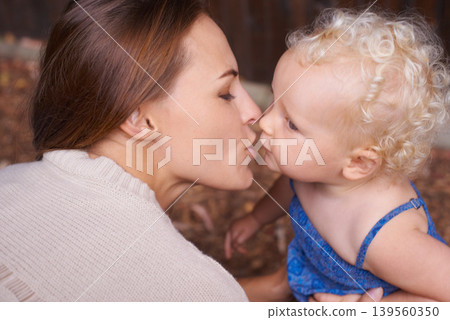 Mother, love and kiss of baby in house, trust and parent support for mama bond with happiness in care. Woman, nurture and toddler daughter with together, wellness and hug kid for bonding in apartment Mother, love and kiss of baby in house, trust and parent support for mama bond with happiness in care. Woman, nurture and toddler daughter with together, wellness and hug kid for bonding in apartment 139560350