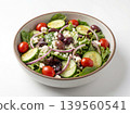Fresh greek salad in a bowl with feta cheese olives cucumbers red onion side dish farm to table food photography cucumber vegetable mediterranean appetizer vegetarian restaurant ingredients 139560541