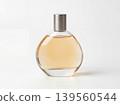Elegant perfume bottle with golden liquid glass bottle personal care white background round bottle glass container women s perfume men s cologne fragrance bottle beauty product cosmetic pack 139560544