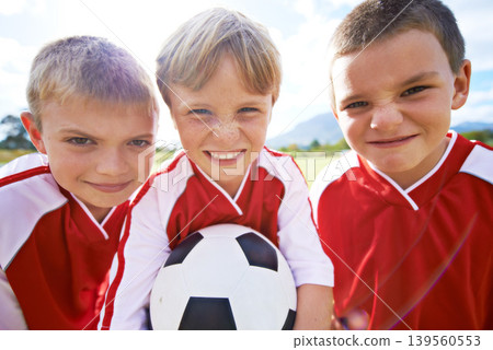 Children, group portrait and soccer team or unity, happy and collaboration or support. People, kids and ready for match and partnership or teamwork, smiling and solidarity or energy for game on field Children, group portrait and soccer team or unity, happy and collaboration or support. People, kids and ready for match and partnership or teamwork, smiling and solidarity or energy for game on field 139560553