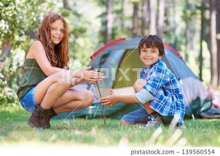 Start, campfire or portrait of children in nature for summer camp, teamwork or learning together. Smile, spark or friends on adventure with sticks or happy kids in woods on holiday vacation in forest Start, campfire or portrait of children in nature for summer camp, teamwork or learning together. Smile, spark or friends on adventure with sticks or happy kids in woods on holiday vacation in forest 139560554