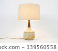 Decorative table lamp with a textured ceramic base and fabric shade high tech kidney bean lighting decorative interior appliance business chandelier contemporary creative entertainment 139560558