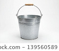 Galvanized metal bucket with wooden handle on a white background galvanized container cleaning traditional equipment isolated household background collection carrying materials 139560589