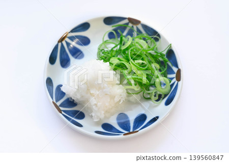 Grated daikon radish and Kujo green onions as condiments. Grated daikon radish and Kujo green onions as condiments. 139560847