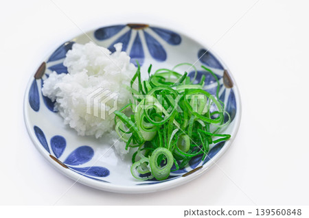 Grated daikon radish and Kujo green onions as condiments. Grated daikon radish and Kujo green onions as condiments. 139560848