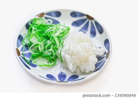 Grated daikon radish and Kujo green onions as condiments. Grated daikon radish and Kujo green onions as condiments. 139560849