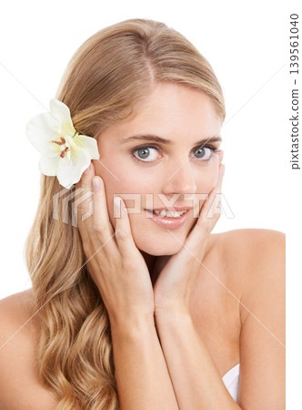 Woman, portrait and beauty in studio with flower, confidence and pride for cosmetic treatment or glow. Model, person or face with smile for haircare organic skincare, or self care on white background Woman, portrait and beauty in studio with flower, confidence and pride for cosmetic treatment or glow. Model, person or face with smile for haircare organic skincare, or self care on white background 139561040