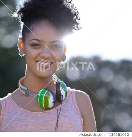 Portrait, student or happy woman at park with headphones at university campus outdoor in nature. Face, college and smile of girl or young person in education for learning to study at school in Brazil Portrait, student or happy woman at park with headphones at university campus outdoor in nature. Face, college and smile of girl or young person in education for learning to study at school in Brazil 139561050