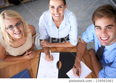 Paperwork, smile and portrait of professional people teamwork on company funding plan, project or strategy. Top view, agency and workforce meeting on investment numbers, budget or accounting research Paperwork, smile and portrait of professional people teamwork on company funding plan, project or strategy. Top view, agency and workforce meeting on investment numbers, budget or accounting research 139561061