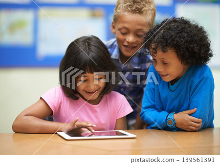Students, children on tablet and school for online education, e learning and website or information in group. Happy kids in diversity with digital technology for knowledge and classroom development Students, children on tablet and school for online education, e learning and website or information in group. Happy kids in diversity with digital technology for knowledge and classroom development 139561391