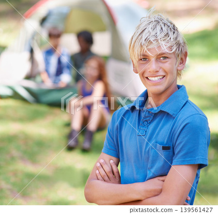 Kid, portrait and smile at summer camp in outdoors, fun and relaxing on vacation or holiday. Happy male person, child and face or confident in park, childhood and adventure or freedom in nature Kid, portrait and smile at summer camp in outdoors, fun and relaxing on vacation or holiday. Happy male person, child and face or confident in park, childhood and adventure or freedom in nature 139561427