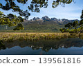 Reflection of Earl Mountains in Mirror Lakes along Milford Sound road, South Island, New Zealand. 139561816