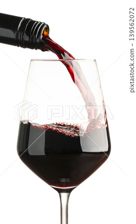 Red wine pouring into glass Red wine pouring into glass 139562072