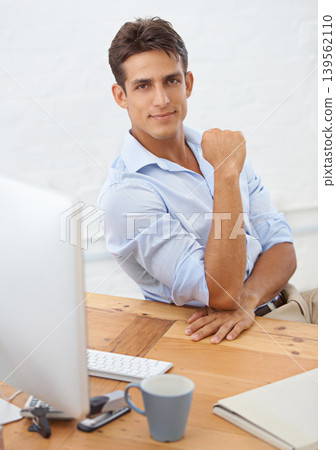 Businessman, computer or portrait with confidence at desk with pride for career ambition or mindset. Person, serious manager or male employee with company experience at workplace, office or desk job Businessman, computer or portrait with confidence at desk with pride for career ambition or mindset. Person, serious manager or male employee with company experience at workplace, office or desk job 139562110