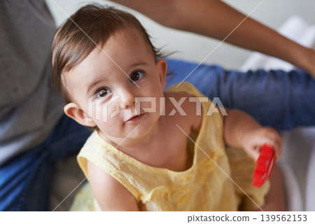 Baby, portrait and toys in living room floor, bonding and sensory growth in family home. Motherhood, girl and play with child development for games, childhood or fun with love, cognition or kids Baby, portrait and toys in living room floor, bonding and sensory growth in family home. Motherhood, girl and play with child development for games, childhood or fun with love, cognition or kids 139562153