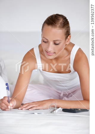 Woman, calculator and financial budget in bed for accounting, saving or expenses. Female person, notebook and notepad in apartment for money growth or income tax for loan, investment or organization Woman, calculator and financial budget in bed for accounting, saving or expenses. Female person, notebook and notepad in apartment for money growth or income tax for loan, investment or organization 139562377