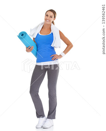 Yoga mat, health and portrait of woman in studio for health, body or pilates workout. Sports, towel and happy young female person with equipment for exercise or training isolated by white background. Yoga mat, health and portrait of woman in studio for health, body or pilates workout. Sports, towel and happy young female person with equipment for exercise or training isolated by white background. 139562461