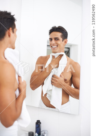 Man, shower and towel after washing in mirror, cleaning and skincare or smile for beauty. Male person, bathroom and wellness in morning routine, reflection and grooming or self care and joy at home Man, shower and towel after washing in mirror, cleaning and skincare or smile for beauty. Male person, bathroom and wellness in morning routine, reflection and grooming or self care and joy at home 139562490