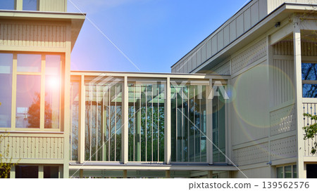 A fragment of a low-rise office building in the classical style. Modernity and tradition in office architecture. A fragment of a low-rise office building in the classical style. Modernity and tradition in office architecture. 139562576