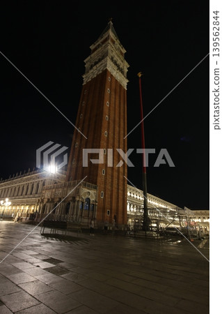 Night view of St. Mark's Campanile in the old town of Venice, Italy. 139562844