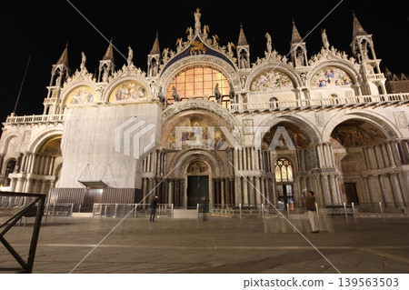 Night view of St. Mark's Basilica in the old town of Venice, Italy. 139563503