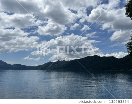Clouds floating over Lake Tazawa in midsummer Clouds floating over Lake Tazawa in midsummer 139563824