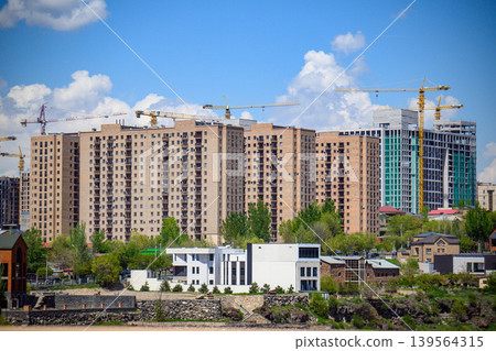 City skyline featuring tall residential towers being built City skyline featuring tall residential towers being built 139564315