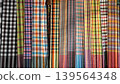 Colorful Thai traditional checkered patterns hanging in a row 139564348
