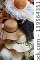 Beautiful collection of various women straw sun hats 139564351
