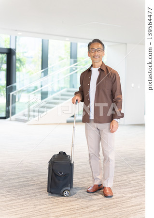 Senior male travelers staying at a hotel Senior male travelers staying at a hotel 139564477