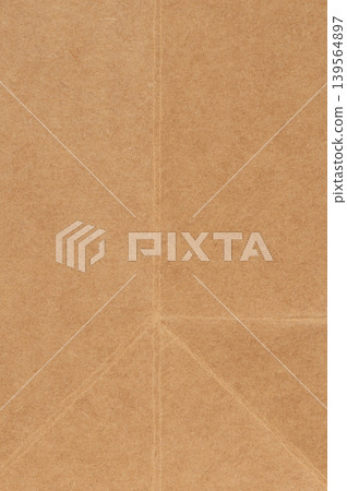 Brown paper surface with crease lines 139564897