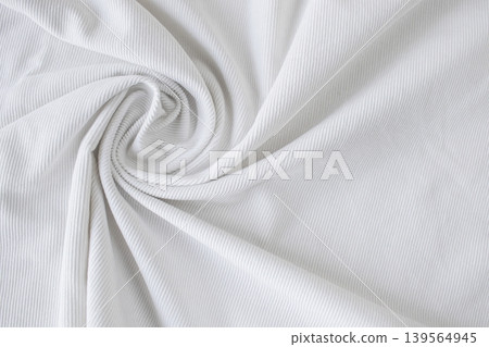 Texture of white velvet fabric with folds and curls. White fabric curl with thin stripes. 139564945