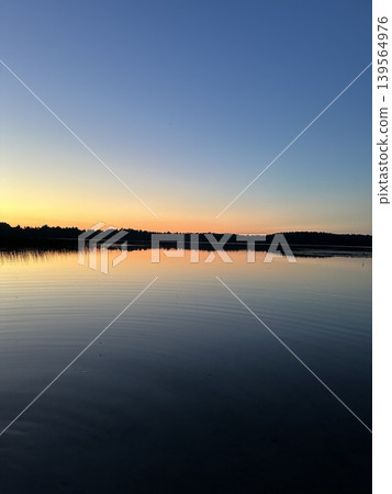 Sunset reflection on the lake. Random photos nature landscape lake. Sunset reflection on the lake. Random photos nature landscape lake. 139564976